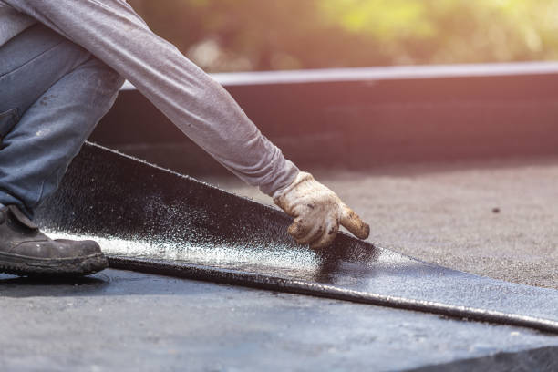 Professional Emergency Waterproofing technician working in Harvard, IL